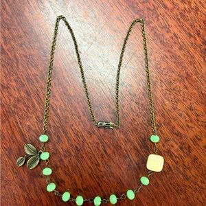 Brass and green glass station necklace.